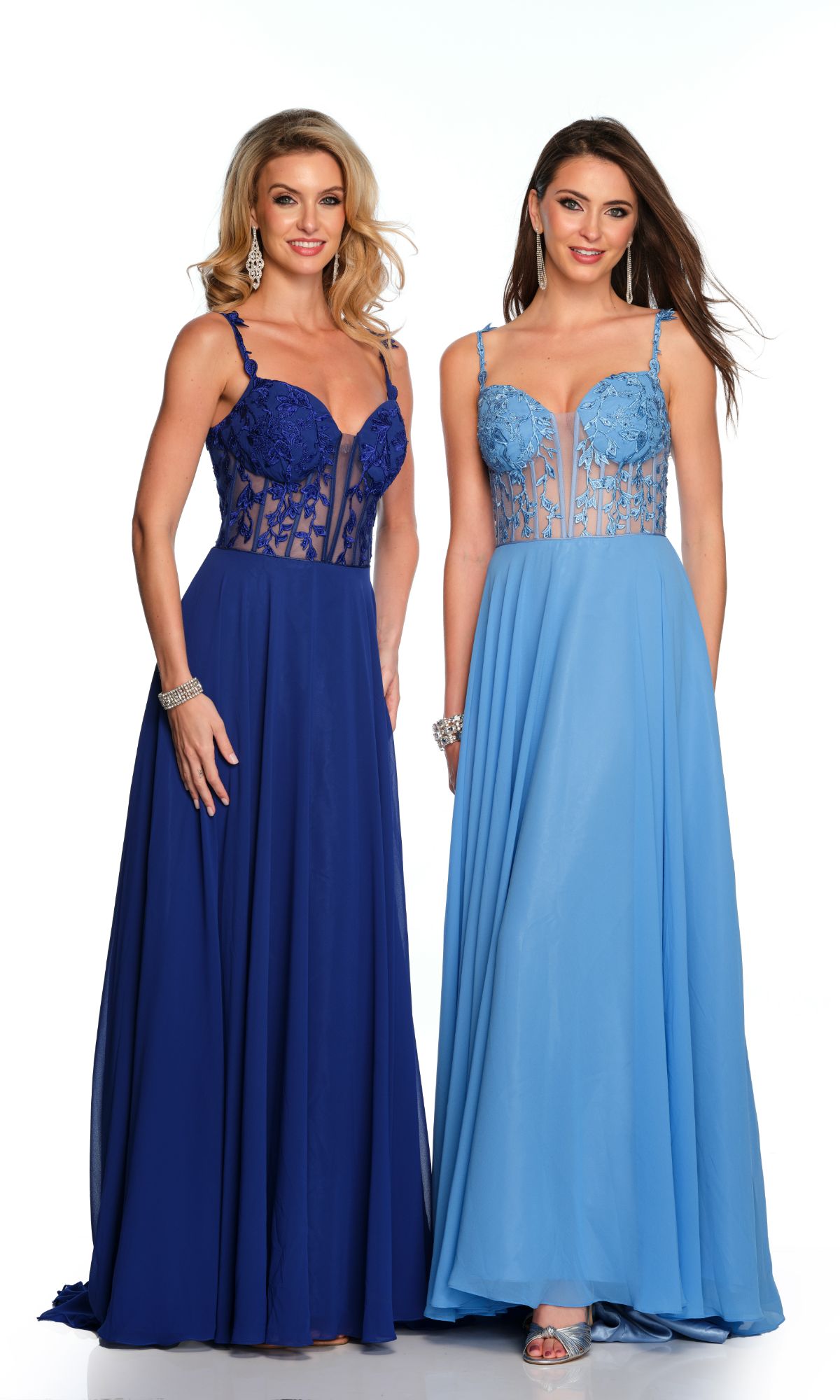 Two women stand side by side in Long Formal Dress 11582 by Dave and Johnny, featuring elegant blue A-line silhouettes with lace embroidery and sheer panels, posing against a plain white background.